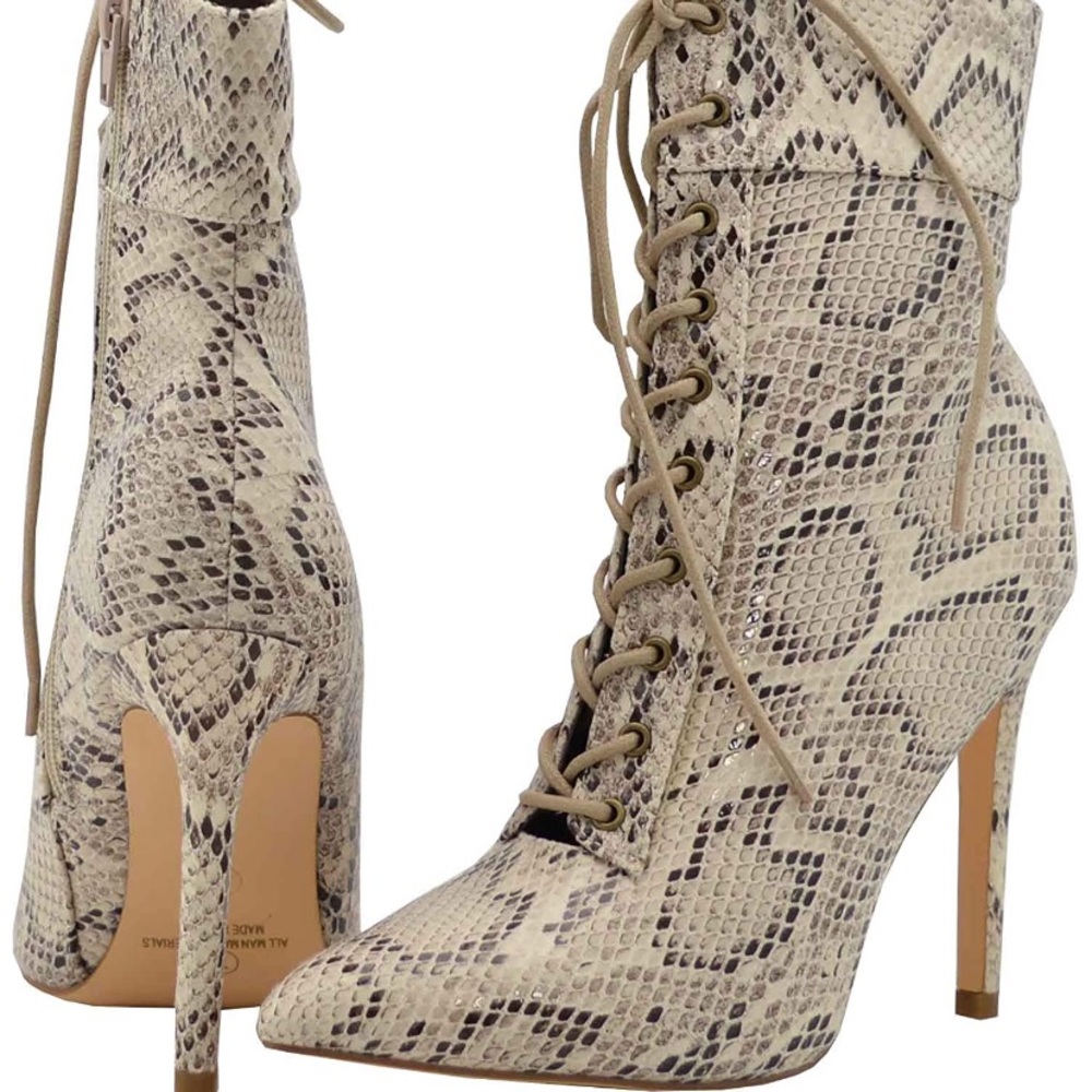 snakeskin pointed toe ankle bootie stilettos